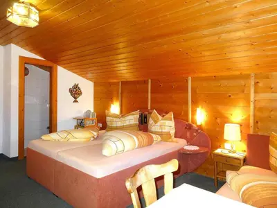 Ein Bett oder Betten in einem Zimmer der Unterkunft Apartment in Fügen with parking space