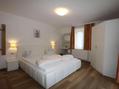 Ein Bett oder Betten in einem Zimmer der Unterkunft Chalet in Fügen near Spieljochbahn