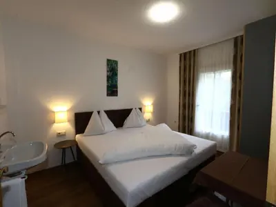 Ein Bett oder Betten in einem Zimmer der Unterkunft holiday home Bergheim, Fügen