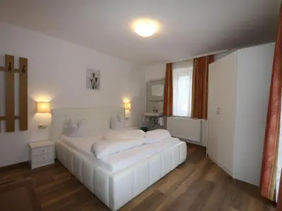 Ein Bett oder Betten in einem Zimmer der Unterkunft holiday home Bergheim, Fügen