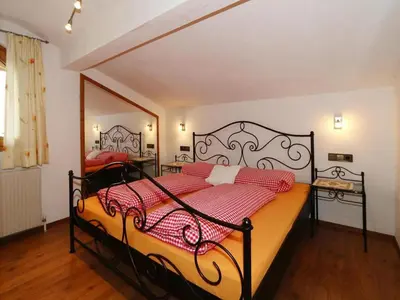 Ein Bett oder Betten in einem Zimmer der Unterkunft Apartment in Hippach im Zillertal in the mountains