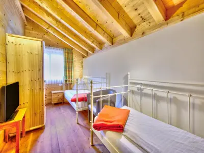 Ein Bett oder Betten in einem Zimmer der Unterkunft Feriendorf Wildschönau in Kitzbühel Alps