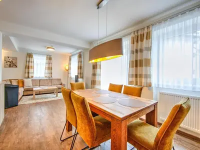 Ein Sitzbereich in der Unterkunft Ski-In Ski-Out Brunner Apartment Top 2