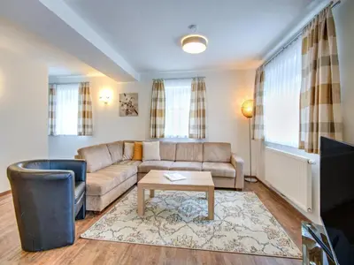 Ein Sitzbereich in der Unterkunft Ski-In Ski-Out Brunner Apartment Top 2