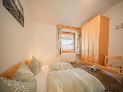 Ein Bett oder Betten in einem Zimmer der Unterkunft Apartment in Brixen near Wilder Kaiser Gondola