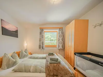 Ein Bett oder Betten in einem Zimmer der Unterkunft Apartment in Brixen near Wilder Kaiser Gondola