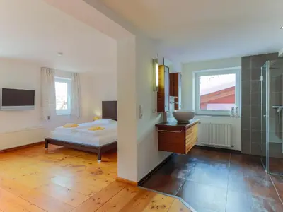 Ein Bett oder Betten in einem Zimmer der Unterkunft Luxurious Holiday Home in Krimml with Sauna