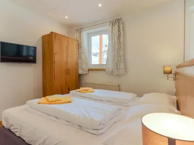 Ein Bett oder Betten in einem Zimmer der Unterkunft Luxurious Holiday Home in Krimml with Sauna