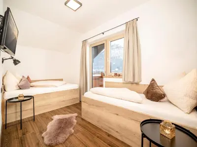 Ein Bett oder Betten in einem Zimmer der Unterkunft Penthouse in Strass near Zillertal Alps