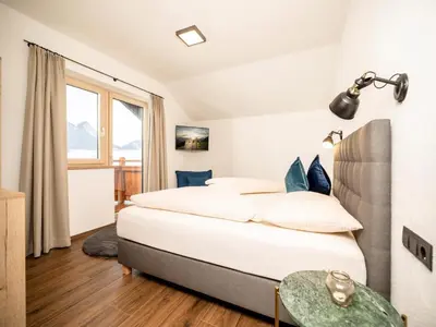 Ein Bett oder Betten in einem Zimmer der Unterkunft Penthouse in Strass near Zillertal Alps