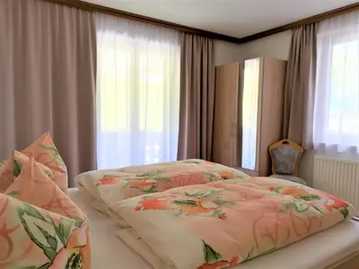 Ein Bett oder Betten in einem Zimmer der Unterkunft Apartment in Mayrhofen with a balcony