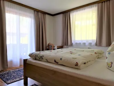 Ein Bett oder Betten in einem Zimmer der Unterkunft Apartment in Mayrhofen with a balcony