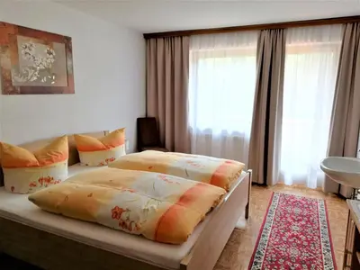 Ein Bett oder Betten in einem Zimmer der Unterkunft Apartment in Mayrhofen with a balcony