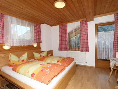 Ein Bett oder Betten in einem Zimmer der Unterkunft Chalet in Mayrhofen near Ski Slopes