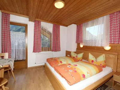 Ein Bett oder Betten in einem Zimmer der Unterkunft Chalet in Mayrhofen near Ski Slopes