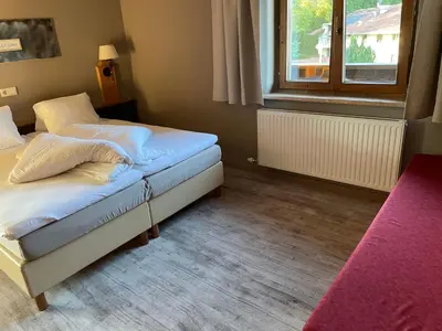 Ein Bett oder Betten in einem Zimmer der Unterkunft Schwaiger
