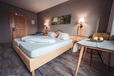 Ein Bett oder Betten in einem Zimmer der Unterkunft Schwaiger