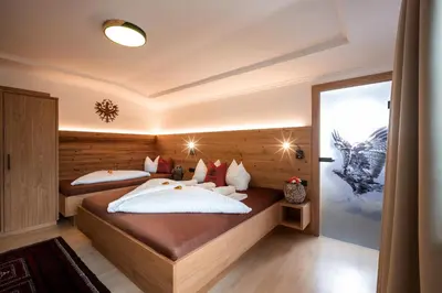 Ein Bett oder Betten in einem Zimmer der Unterkunft Alpinschlössl