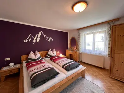 Ein Bett oder Betten in einem Zimmer der Unterkunft Apartment Bauernhof Gasteg - L by Interhome