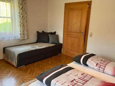 Ein Bett oder Betten in einem Zimmer der Unterkunft Apartment Bauernhof Gasteg - L by Interhome