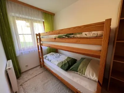 Ein Bett oder Betten in einem Zimmer der Unterkunft Apartment Bauernhof Gasteg - L by Interhome
