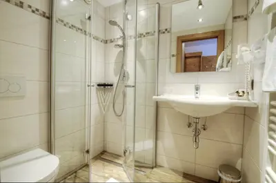 Ein Badezimmer in der Unterkunft Hotel & Art Kristiana