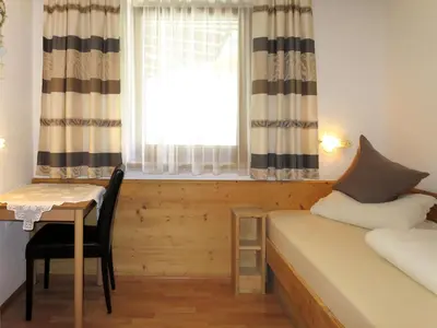Ein Bett oder Betten in einem Zimmer der Unterkunft Apartment Neuner-1 by Interhome