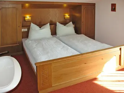 Ein Bett oder Betten in einem Zimmer der Unterkunft Apartment Hochwart by Interhome