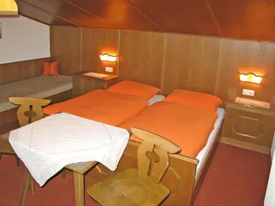 Ein Bett oder Betten in einem Zimmer der Unterkunft Apartment Hochwart by Interhome