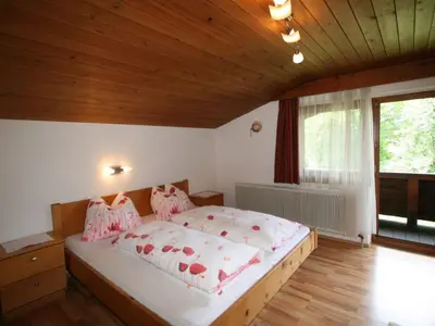 Ein Bett oder Betten in einem Zimmer der Unterkunft Apartment Klocker by Interhome