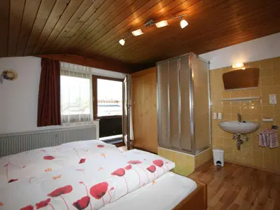 Ein Bett oder Betten in einem Zimmer der Unterkunft Apartment Klocker by Interhome