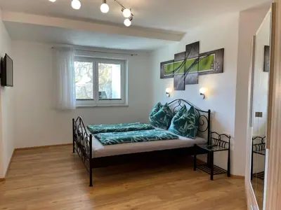 Ein Bett oder Betten in einem Zimmer der Unterkunft Apartment Bergblick by Interhome