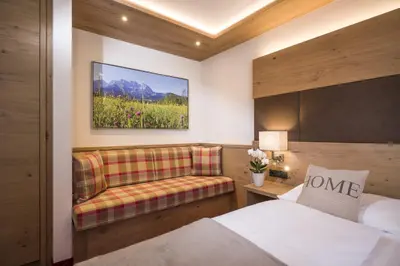Ein Bett oder Betten in einem Zimmer der Unterkunft Hotel Andreas Hofer