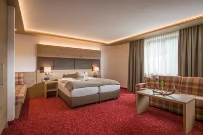 Ein Bett oder Betten in einem Zimmer der Unterkunft Hotel Andreas Hofer
