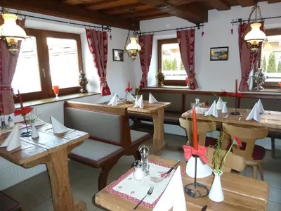 Ein Sitzbereich in der Unterkunft Gasthaus Auwirt