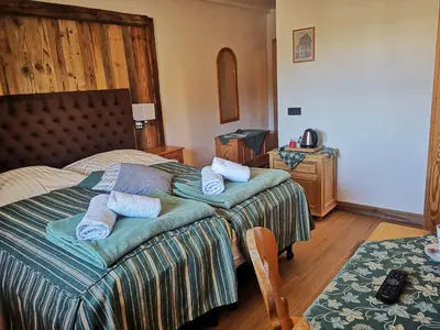 Ein Bett oder Betten in einem Zimmer der Unterkunft Gasthaus Auwirt