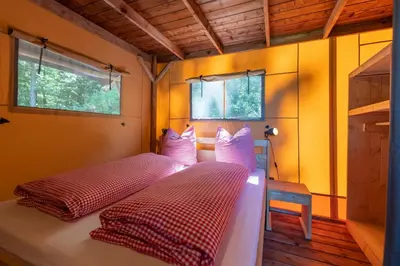 Ein Bett oder Betten in einem Zimmer der Unterkunft Ferienpark Terrassencamping Süd-See