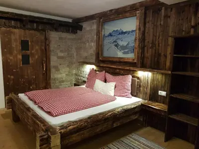 Ein Bett oder Betten in einem Zimmer der Unterkunft Ferienwohnung Schiestl
