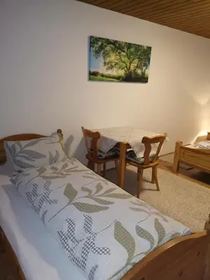 Ein Bett oder Betten in einem Zimmer der Unterkunft Ferienwohnung Schiestl