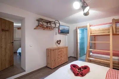 Ein Bett oder Betten in einem Zimmer der Unterkunft Ferienwohnung Bergwelt