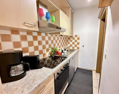 Küche/Küchenzeile in der Unterkunft SMALL & COZY 2 Bedroom City Apartment by Belle Stay