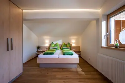 Ein Bett oder Betten in einem Zimmer der Unterkunft Jodlhof