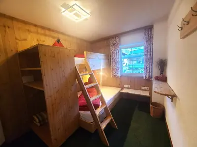 Ein Bett oder Betten in einem Zimmer der Unterkunft Traum-Ferienwohnungen Wechselberger Schwendau