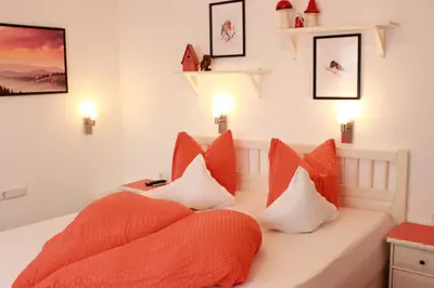 Ein Bett oder Betten in einem Zimmer der Unterkunft Traum-Ferienwohnungen Wechselberger Schwendau