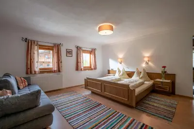 Ein Bett oder Betten in einem Zimmer der Unterkunft Tuxerhof