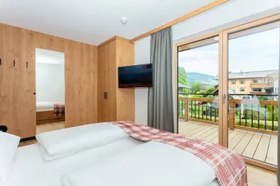 Ein Bett oder Betten in einem Zimmer der Unterkunft Feriengut Ottacherhof - Active Family Holiday in central Hollersbach