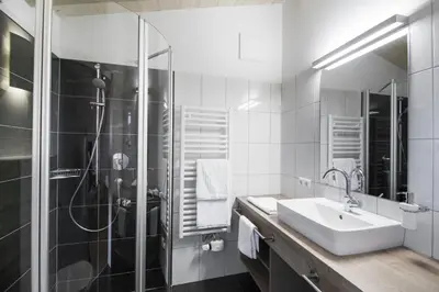 Ein Badezimmer in der Unterkunft Landhotel Föhrenhof Ellmau