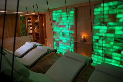 Ein Bett oder Betten in einem Zimmer der Unterkunft Landhotel Föhrenhof Ellmau