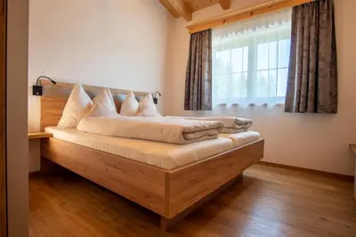 Ein Bett oder Betten in einem Zimmer der Unterkunft Hof Zenzern