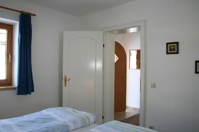 Ein Bett oder Betten in einem Zimmer der Unterkunft Haus Sandra